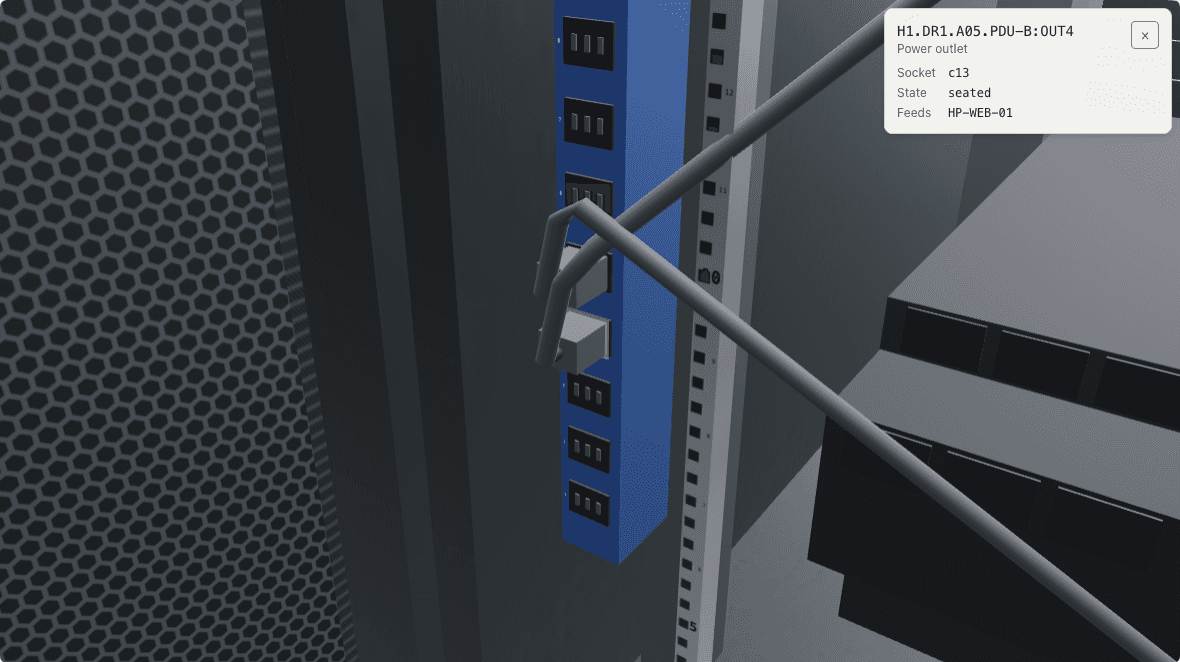 The rear of rack A05, docked at power strip PDU-B: the power cord in outlet 4 sits in its socket, the outlet's sheet beside it reads seated.